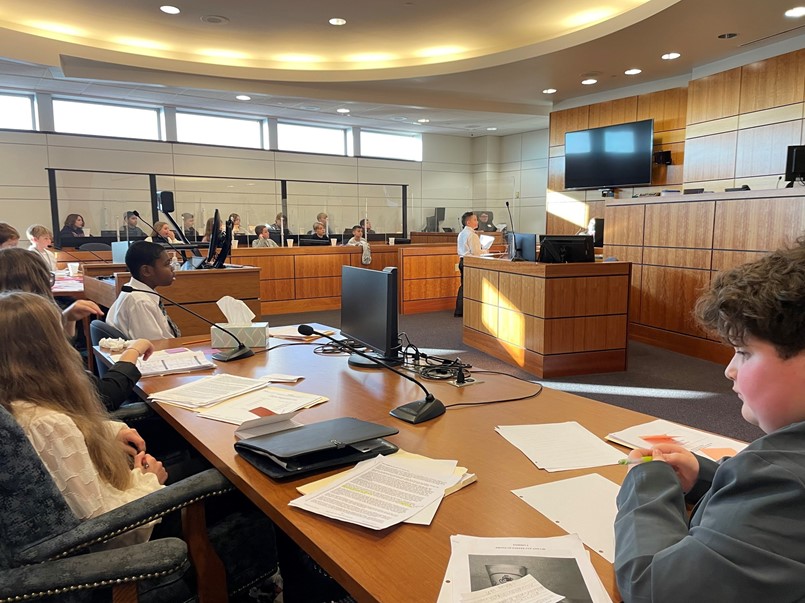 kids sitting in a court room 